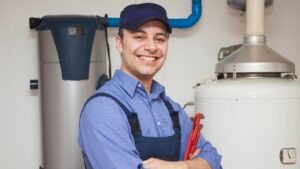 satisfied plumber working with Houston commercial plumbing company