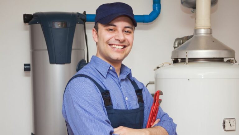 satisfied plumber working with Houston commercial plumbing company